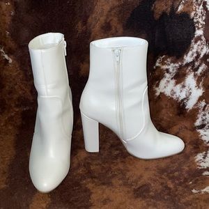 White heeled booties